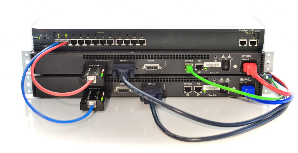 Cisco 2501 router stack with V.35 DB60 serial interlink and dual 10baseT transceivers
